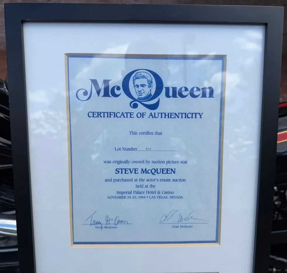 A certificate of authenticity linking the bike to McQueen