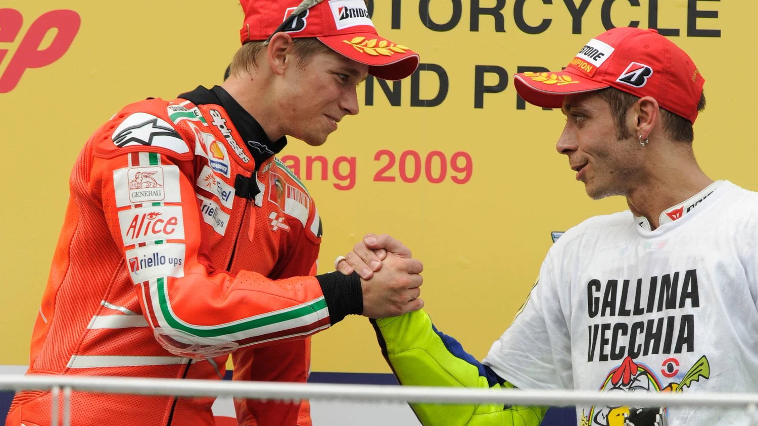 Stoner and Rossi on the podium