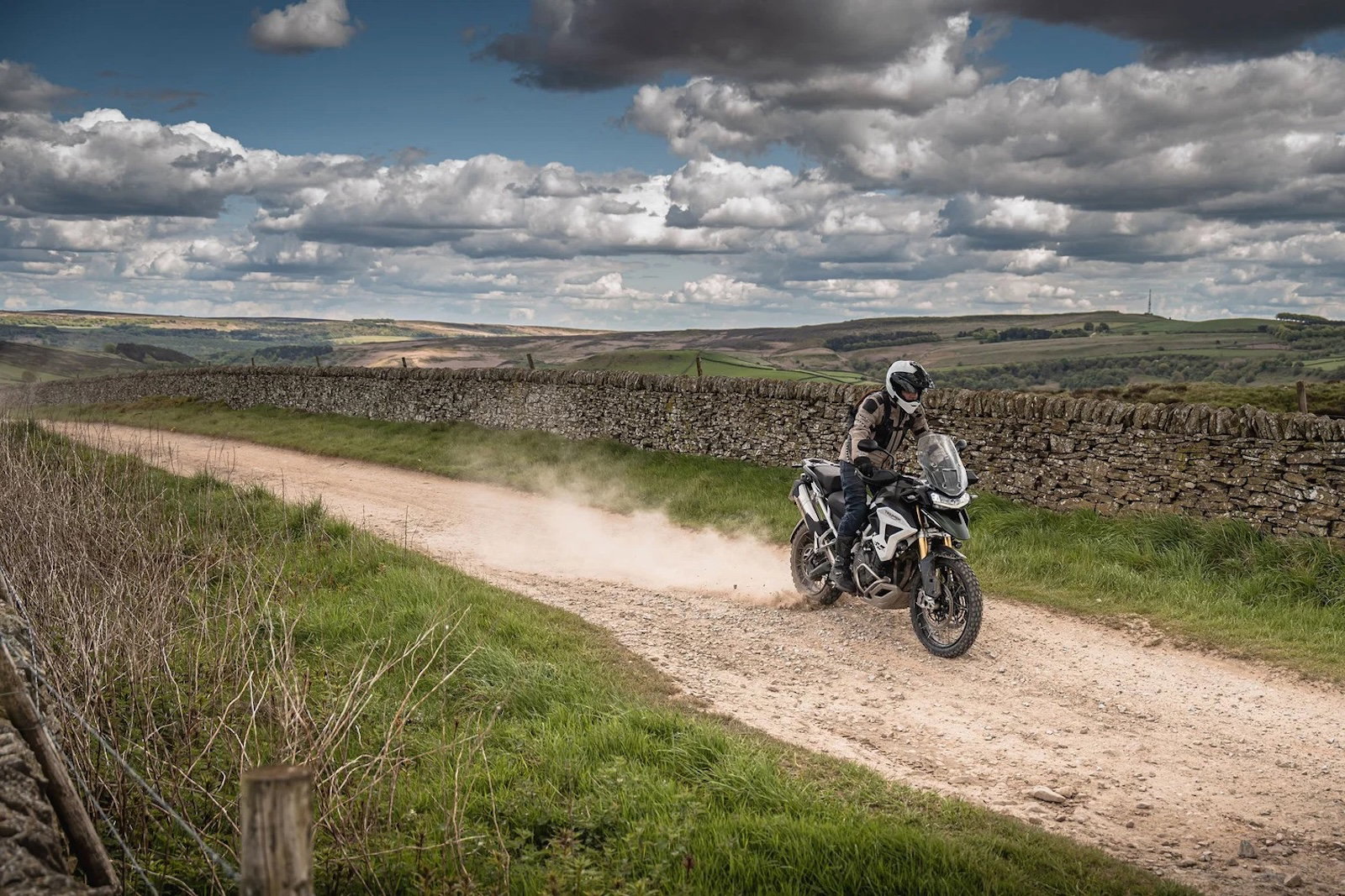 Riding a Tiger 1200 on a green road