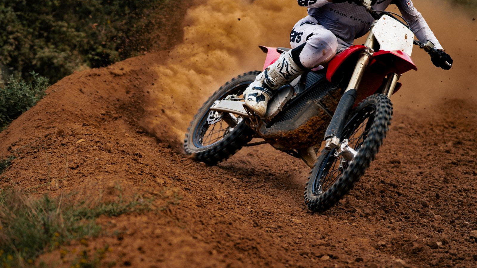 Stark motorcycle riding off-road. 