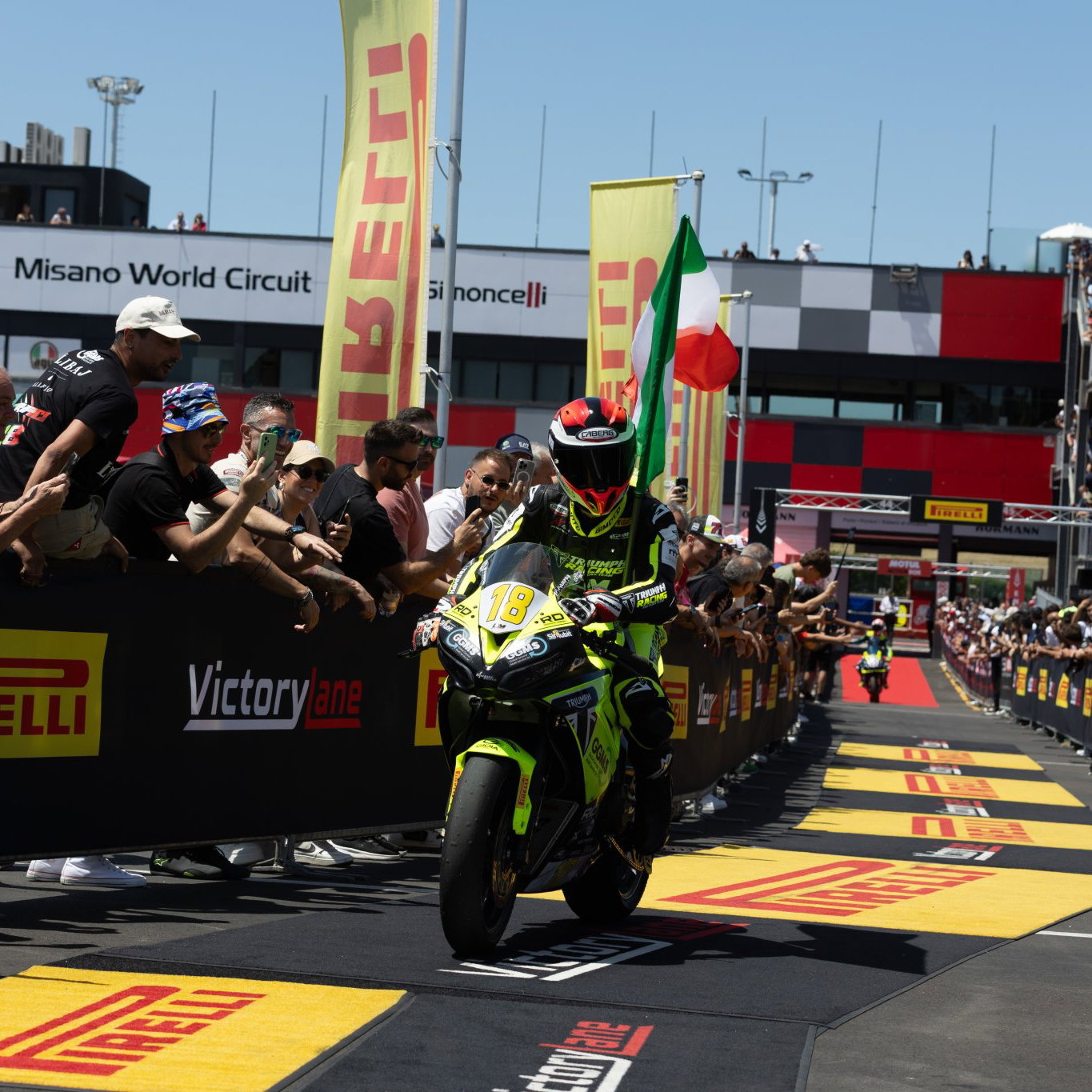 Bruno Ieraci riding a Triumph Daytona 660 into parc ferme at Misano.