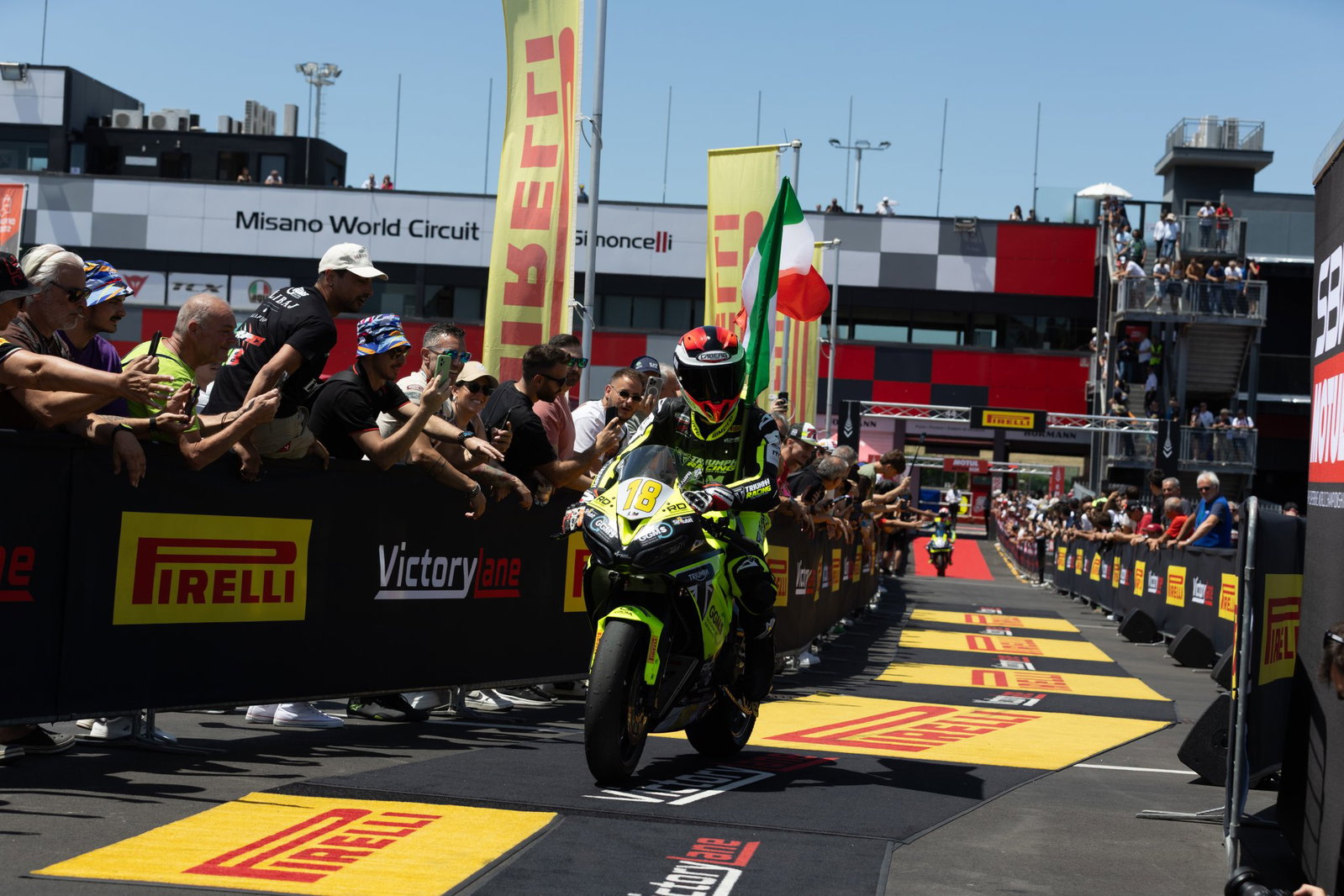 Bruno Ieraci riding a Triumph Daytona 660 into parc ferme at Misano.