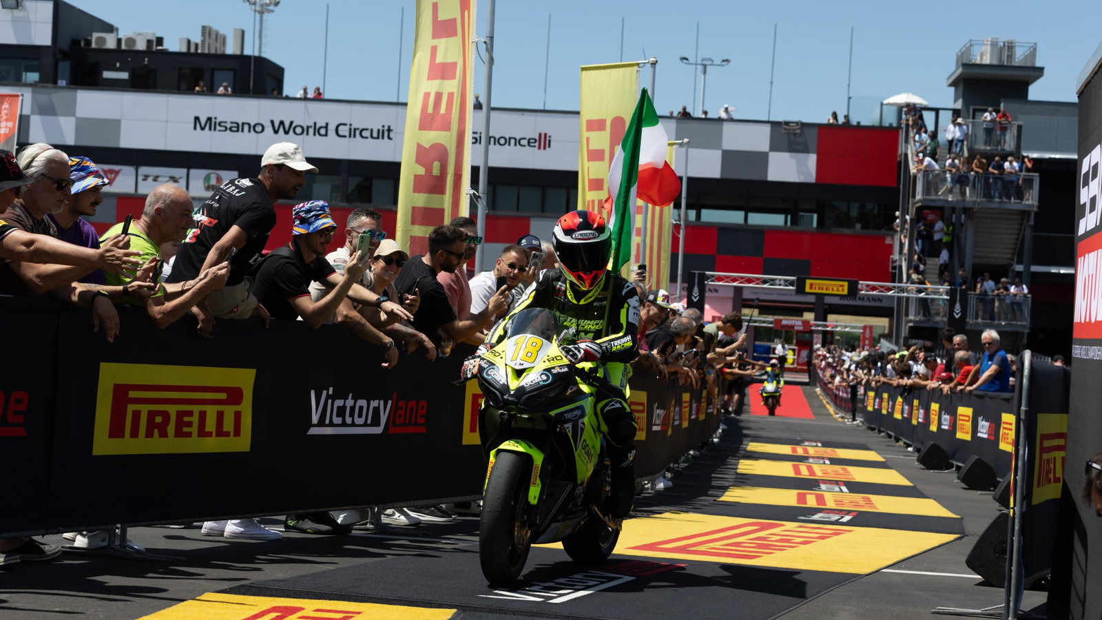 Bruno Ieraci riding a Triumph Daytona 660 into parc ferme at Misano.
