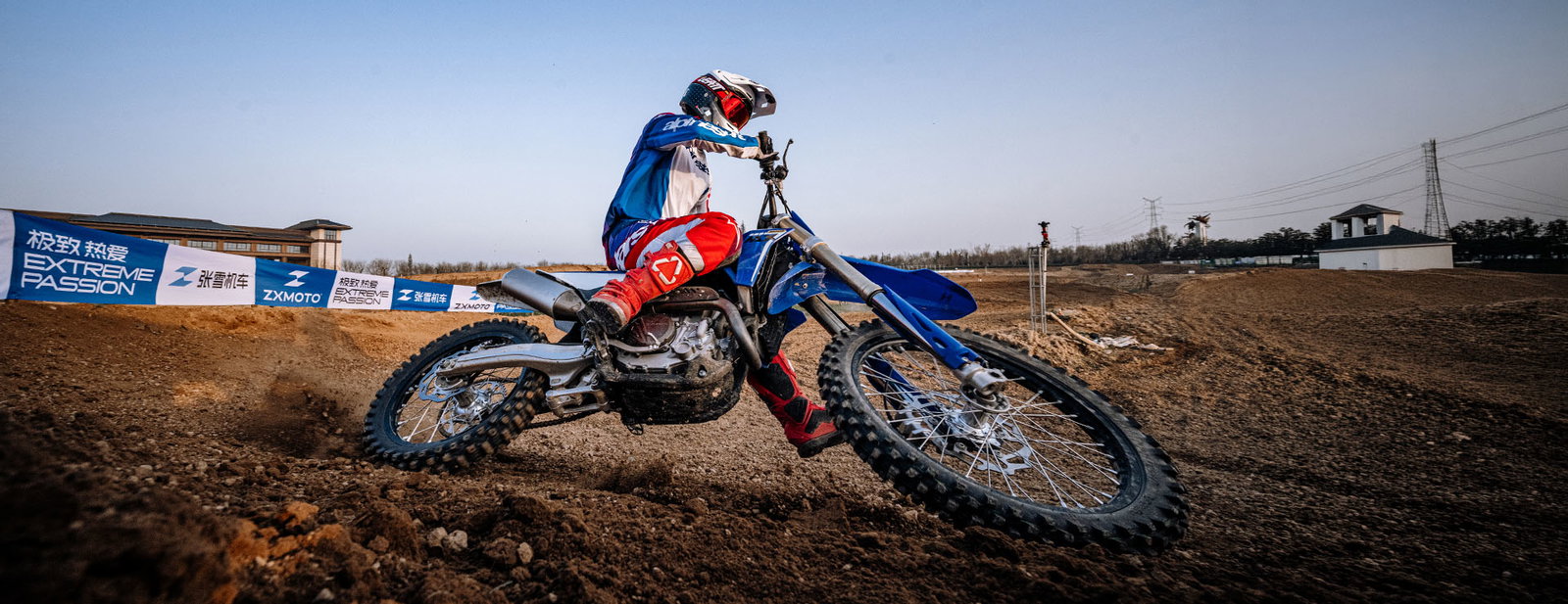 The ZXMoto MX250 riding a berm