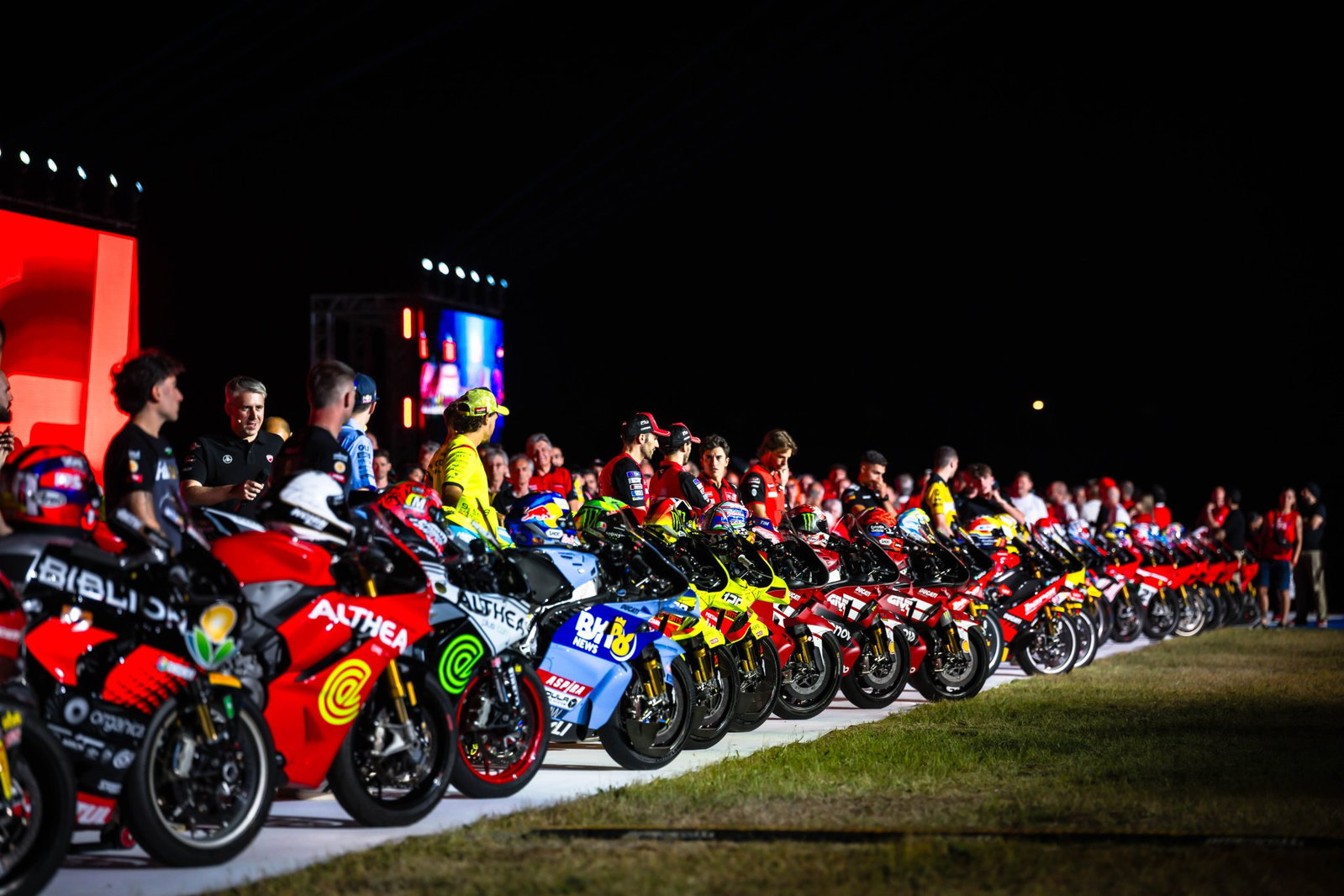 Ducati riders with their race bikes.