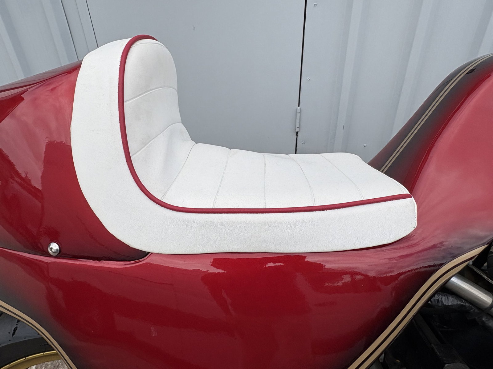 White seat housed by the Moto Martin CB1100F. Credit: H&H Classics.