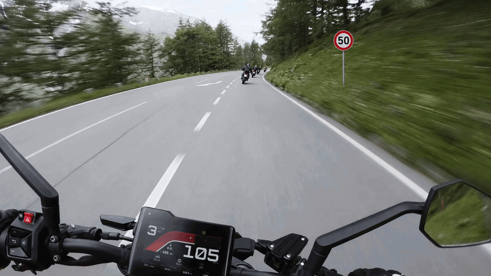 Riding past a 50 speed limit sign
