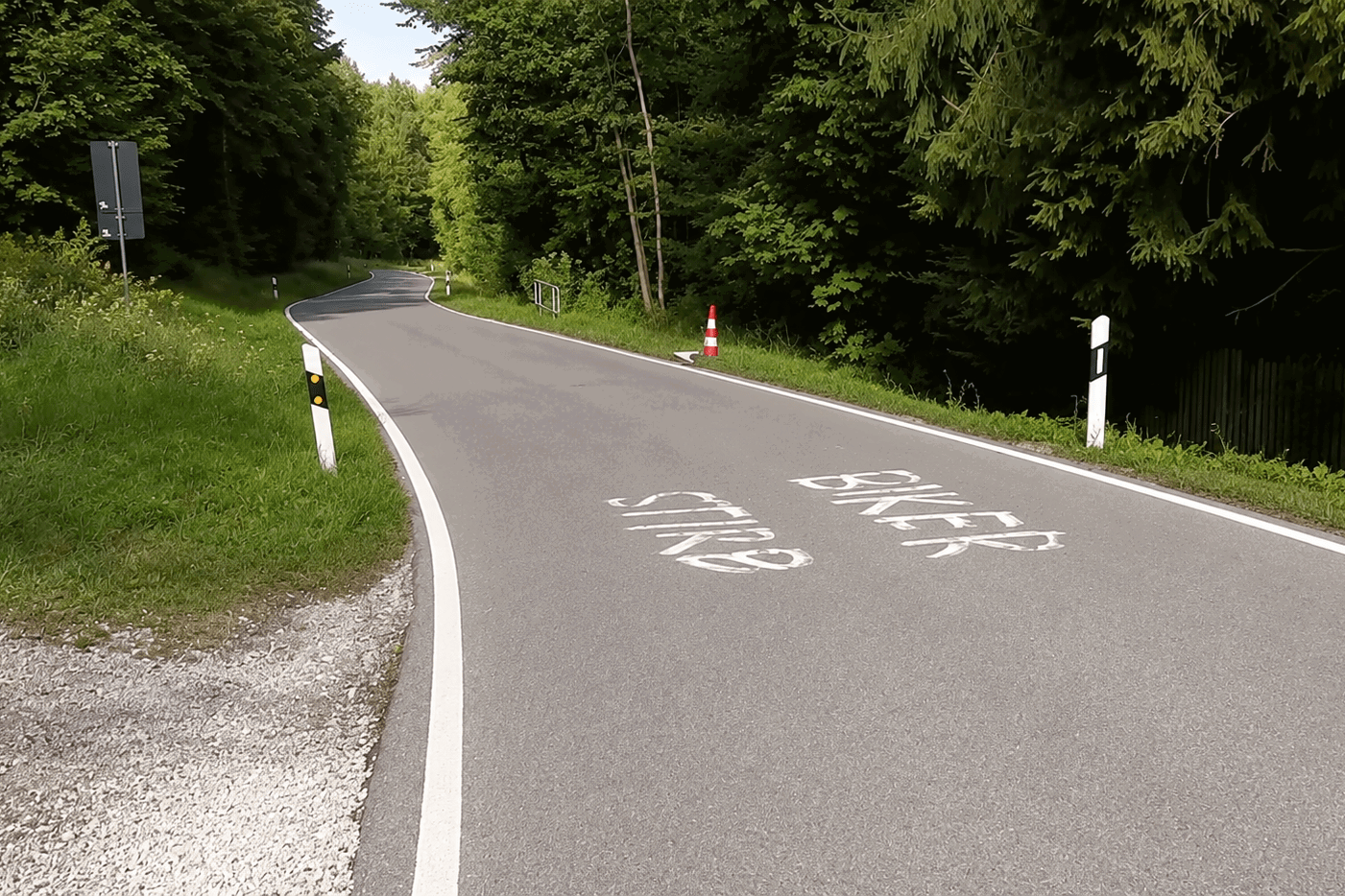 "Biker Stirb" graffiti on a German road