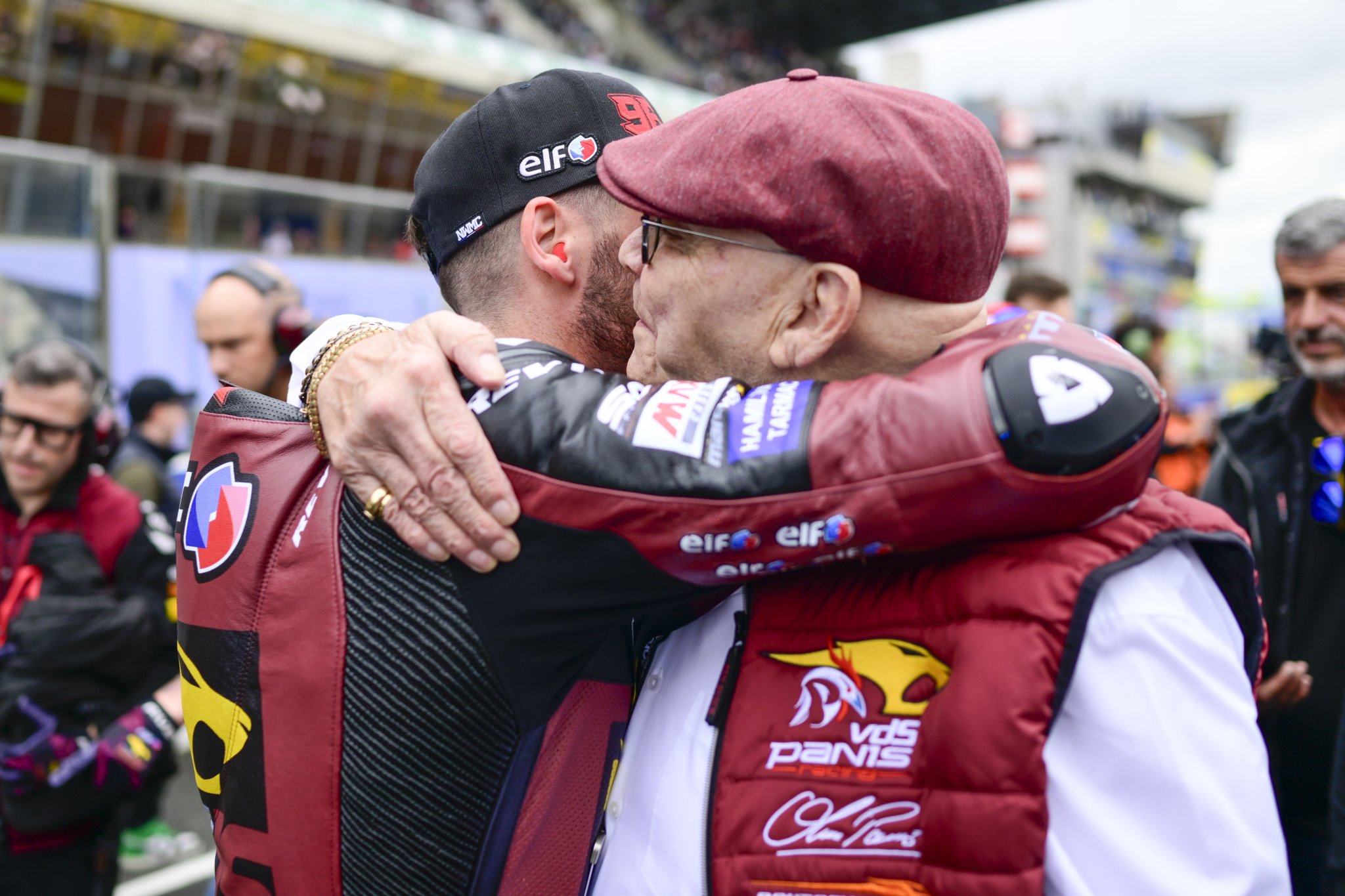 Marc van der Straten with Jake Dixon ahead of a Moto2 race. Credit: Gold and Goose.