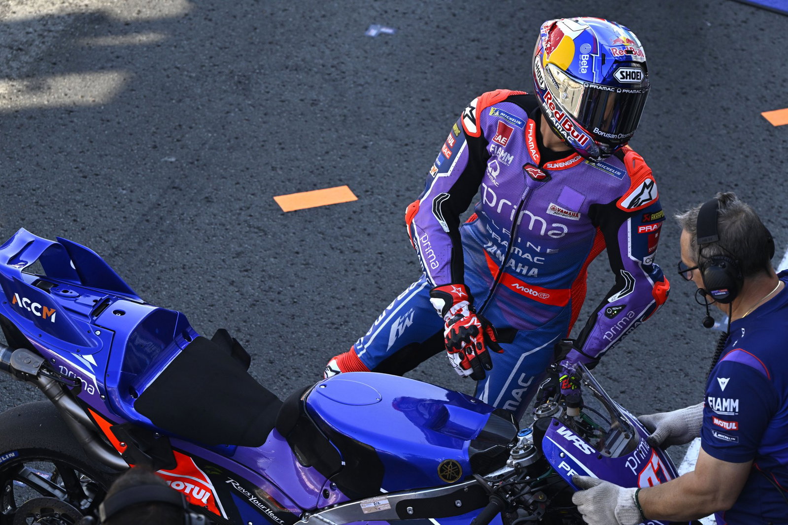 Toprak Razgatlioglu stepping off his Yamaha M1 MotoGP bike.
