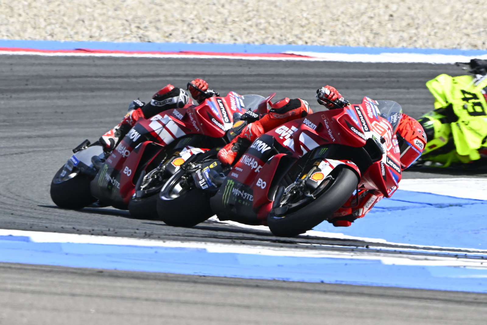 Marc Marquez racing team-mate Pecco Bagnaia. Credit: Gold and Goose.