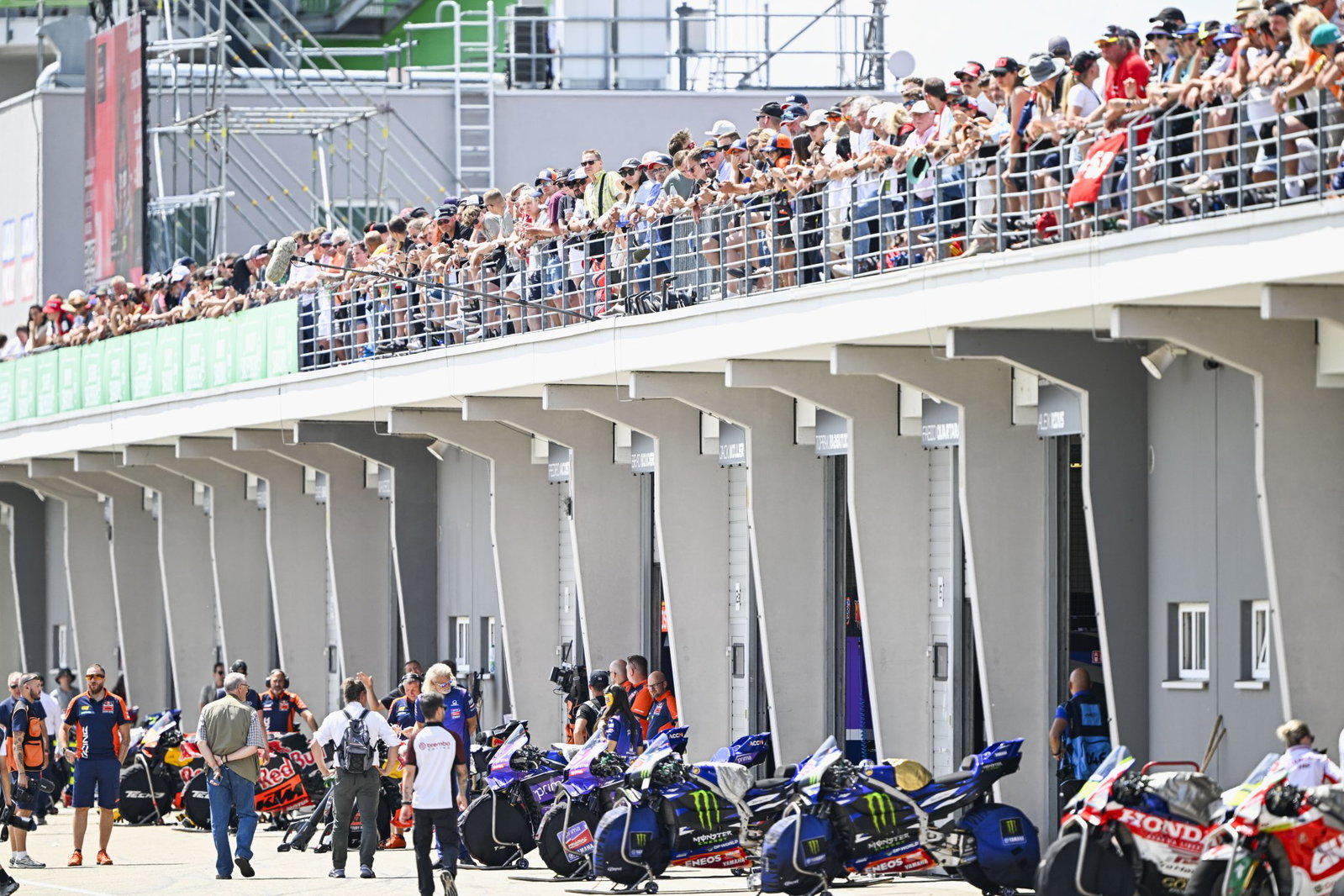MotoGP pit lane at the 2026 German Grand Prix. Credit: Gold and Goose.