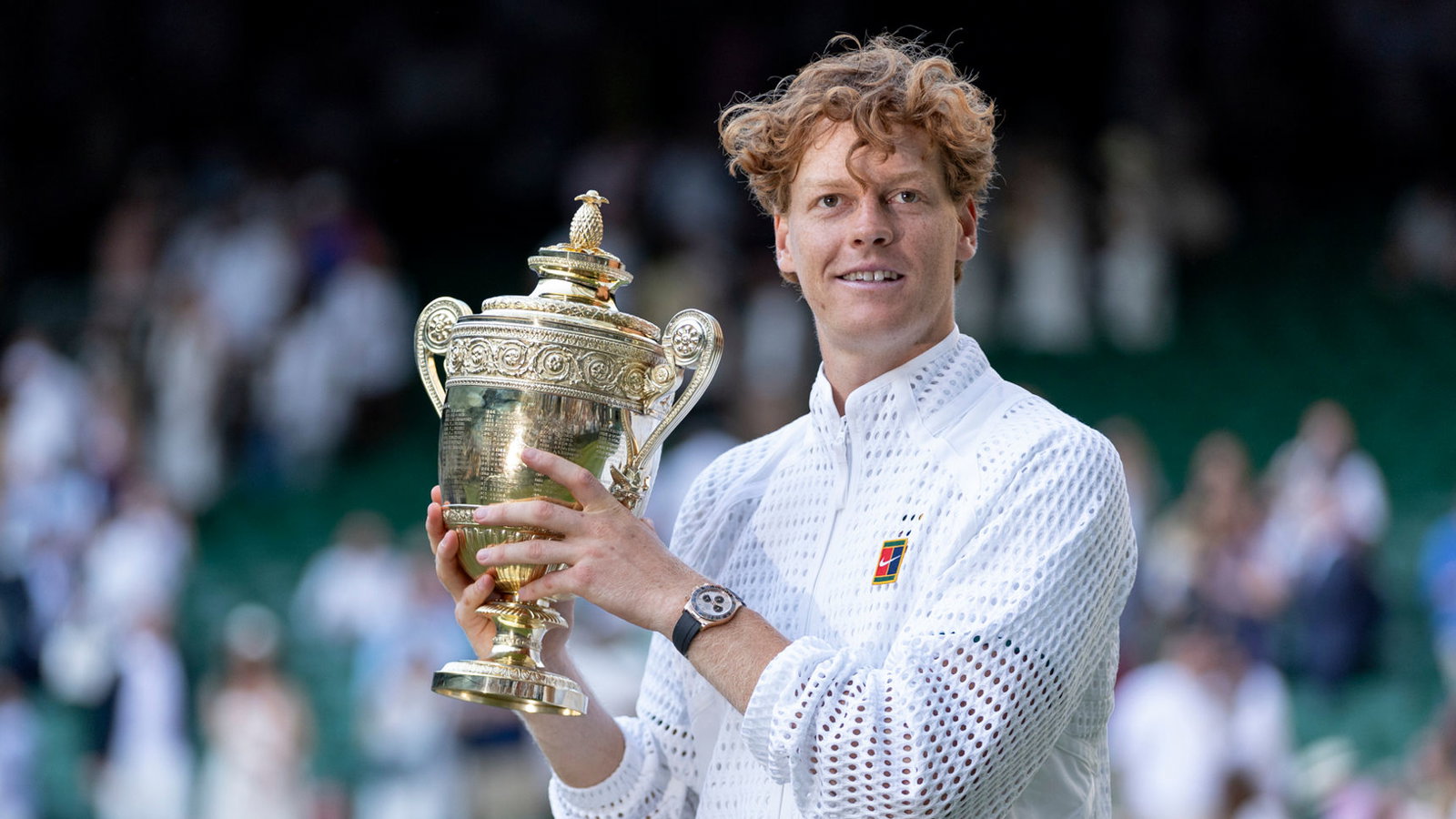 Jannik Sinner holding Wimbledon gentlemen's singles trophy. Credit: Wimbledon.