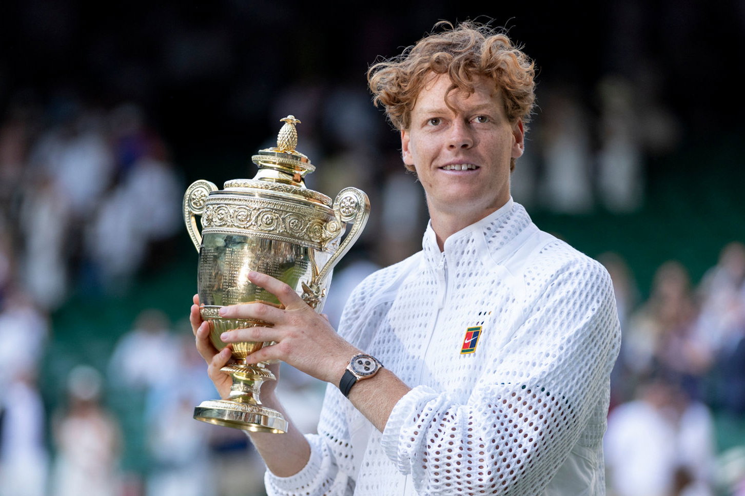 Jannik Sinner holding Wimbledon gentlemen's singles trophy. Credit: Wimbledon.