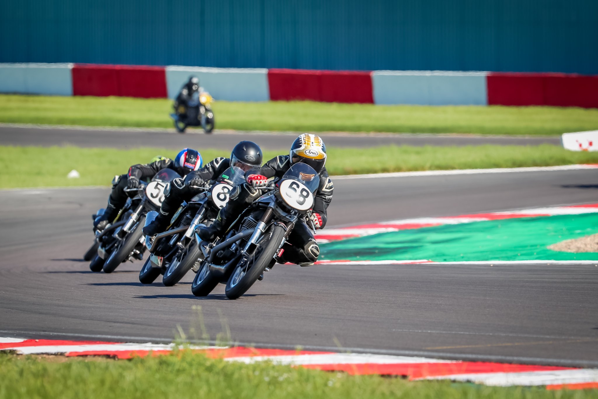 Classic Manx Nortons racing on track