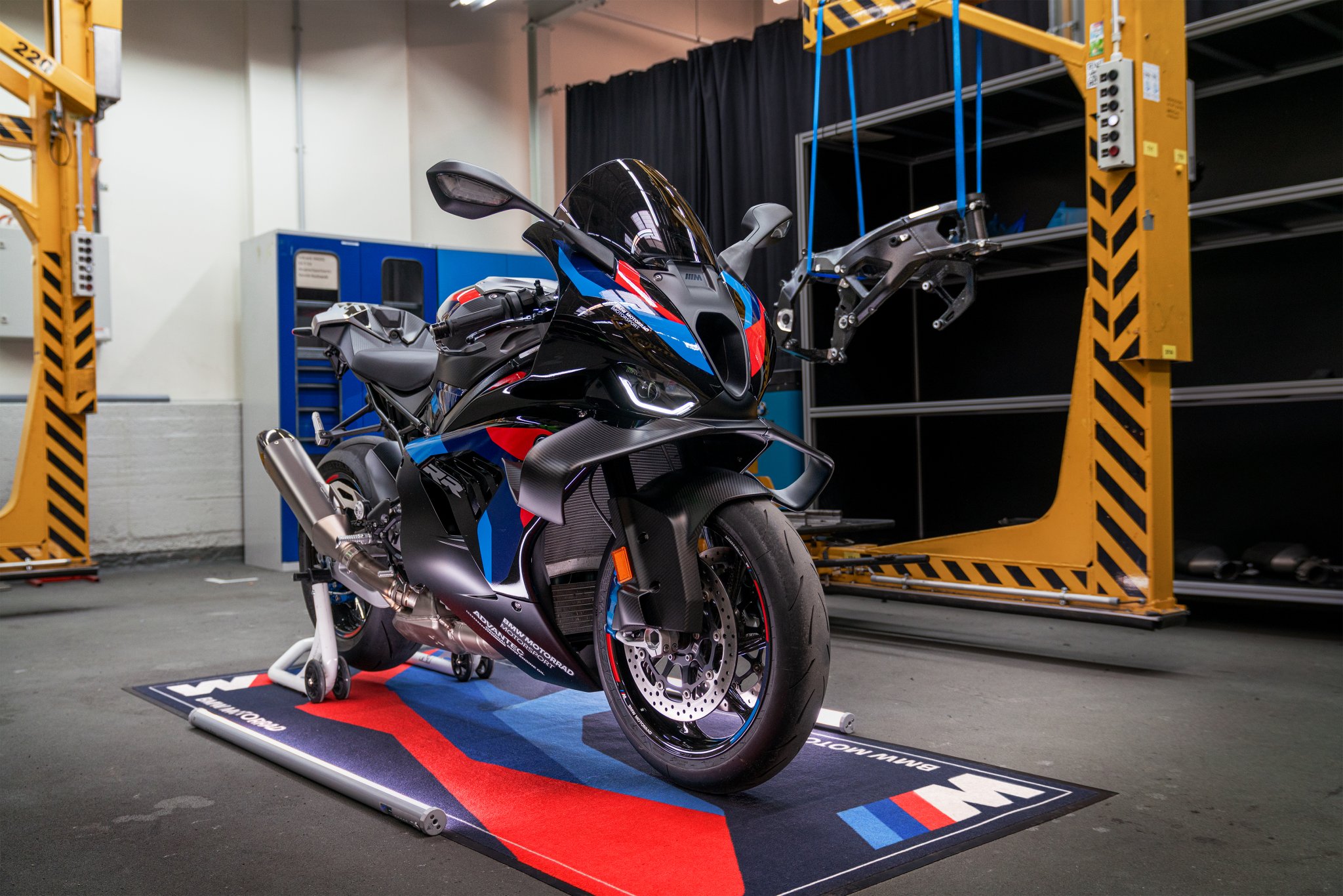 BMW M Motorsport frame alongside BMW's flagship superbike.