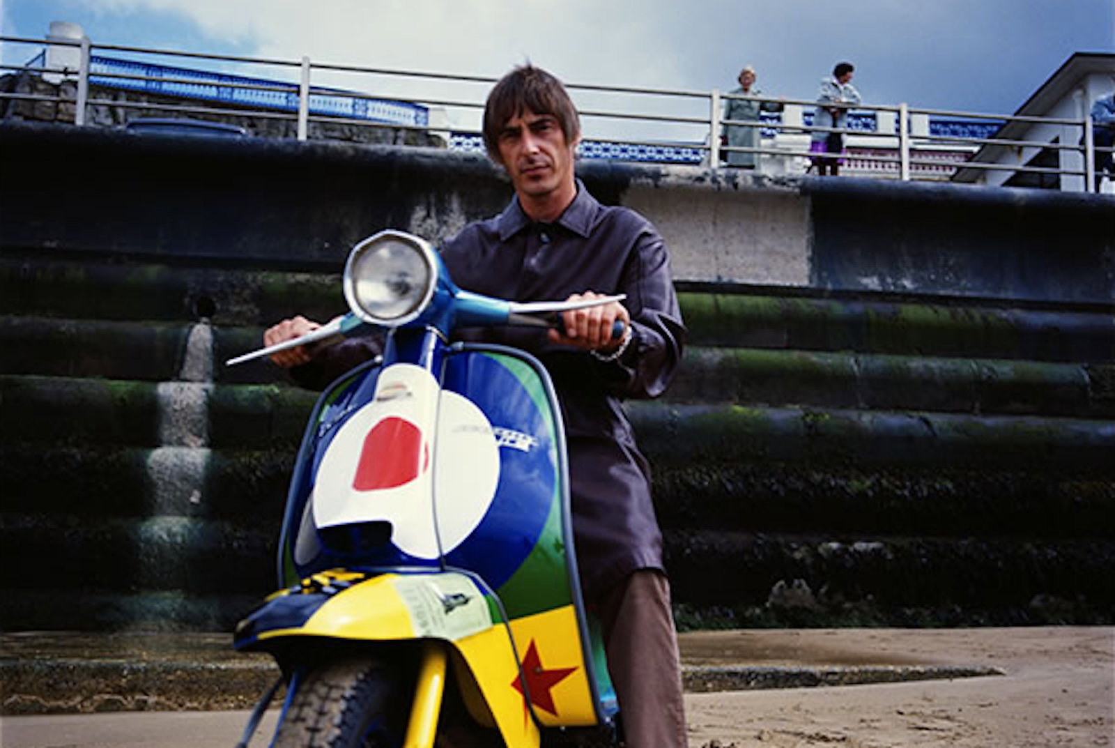 Paul Weller sitting on a his Lambretta Li150 'Stanley Road' scooter