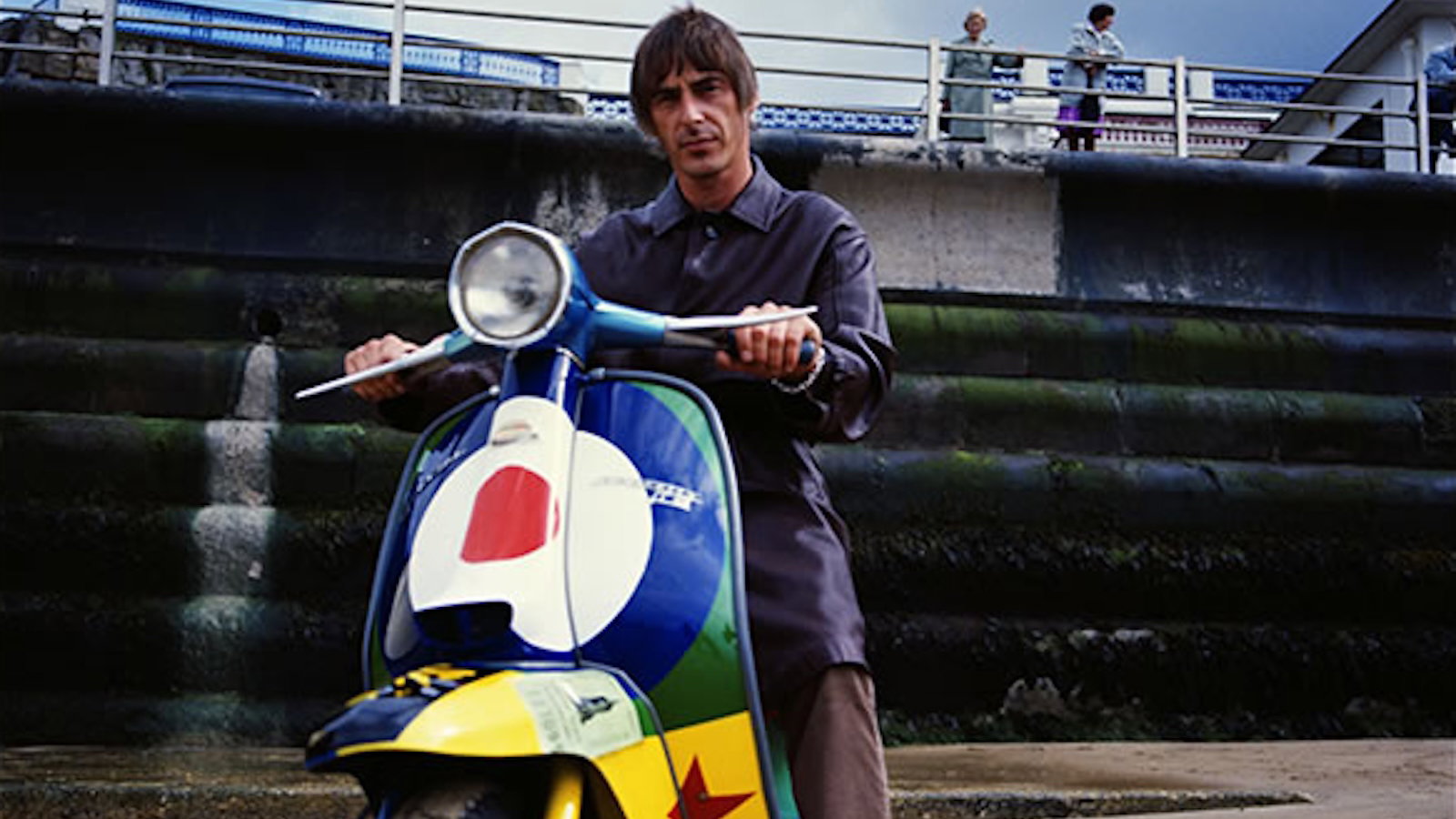 Paul Weller sitting on a his Lambretta Li150 'Stanley Road' scooter