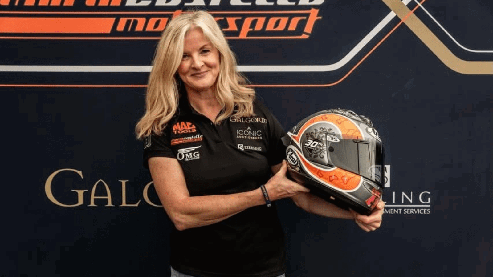 Maria Costello with a special anniversary helmet. Credit: Maria Costello/Facebook.
