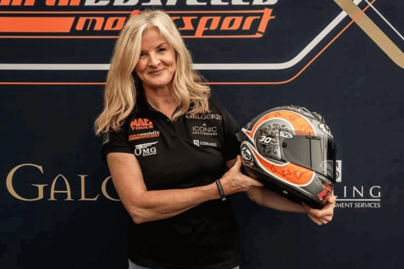 Maria Costello with a special anniversary helmet. Credit: Maria Costello/Facebook.