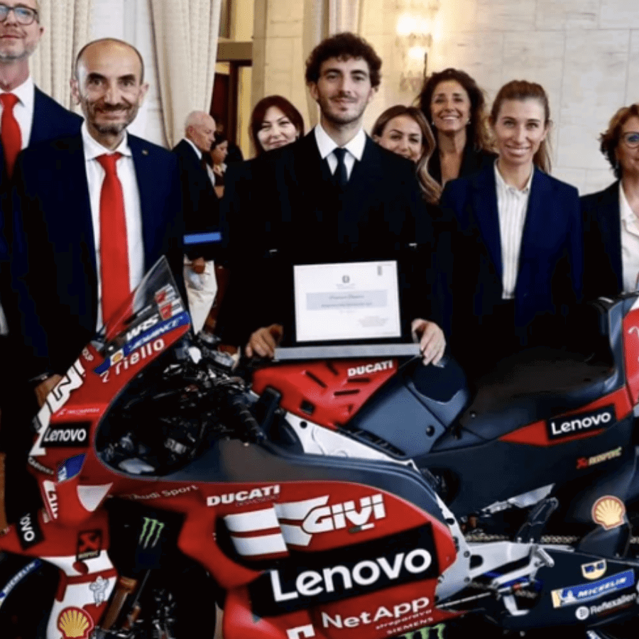 Francesco Bagnaia alongside Ducati CEO Claudio Domenicali. 