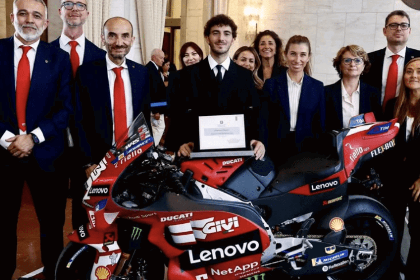 Francesco Bagnaia alongside Ducati CEO Claudio Domenicali.