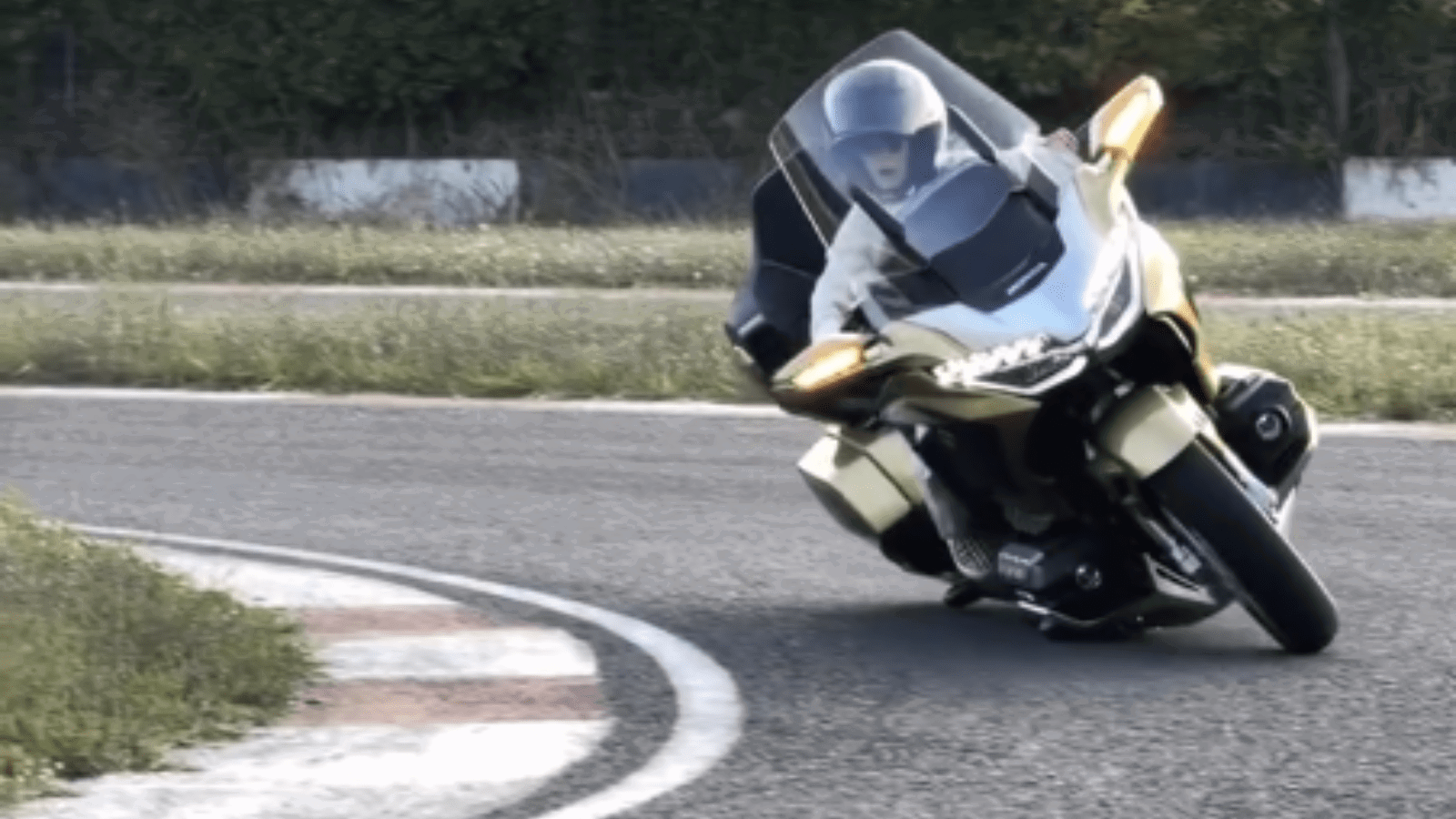 Zayn Sofuoglu turning a Honda Gold Wing.