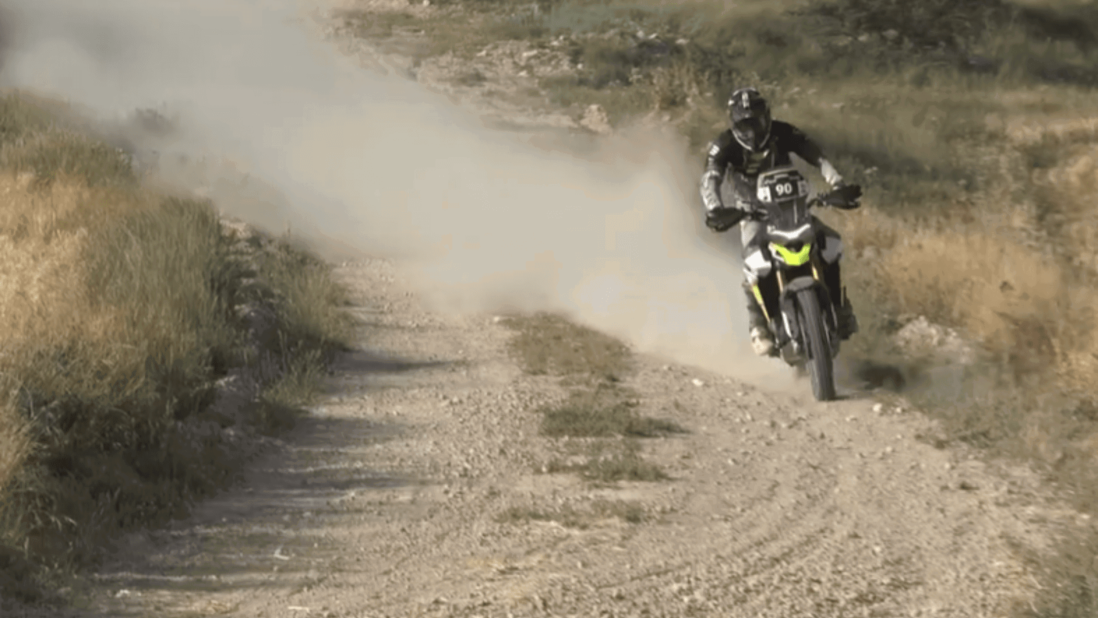 A motorcycle racing at the Baja Espana-Aragon rally.