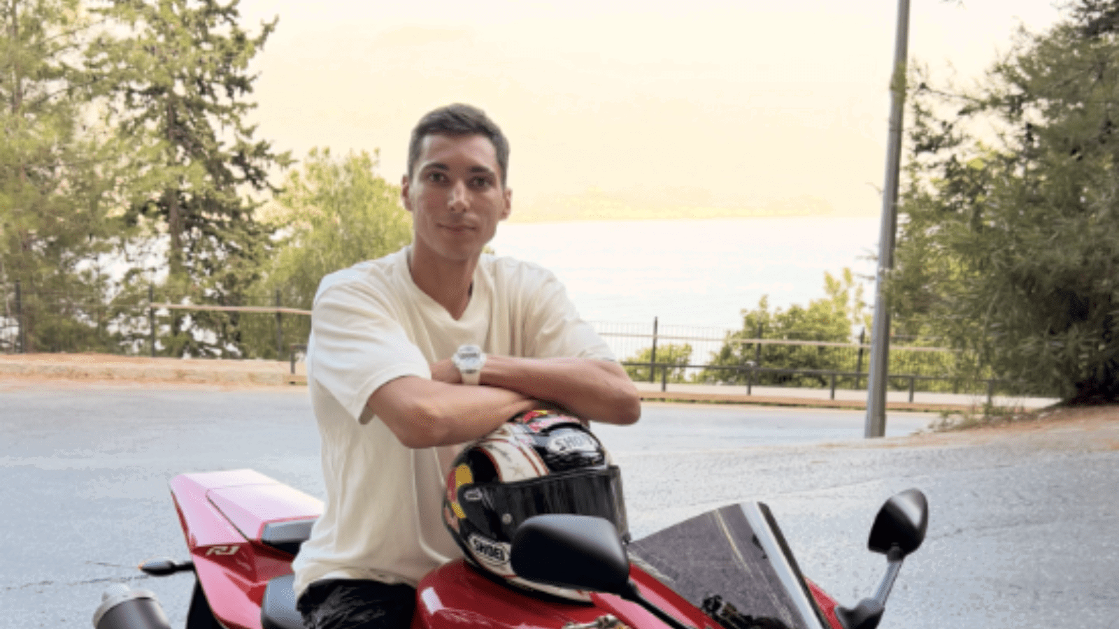 Toprak Razgatlioglu sitting on a Yamaha R1.
