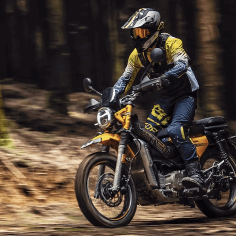 Leten LT190 riding in a forest. Credit: AJS Motorcycles.