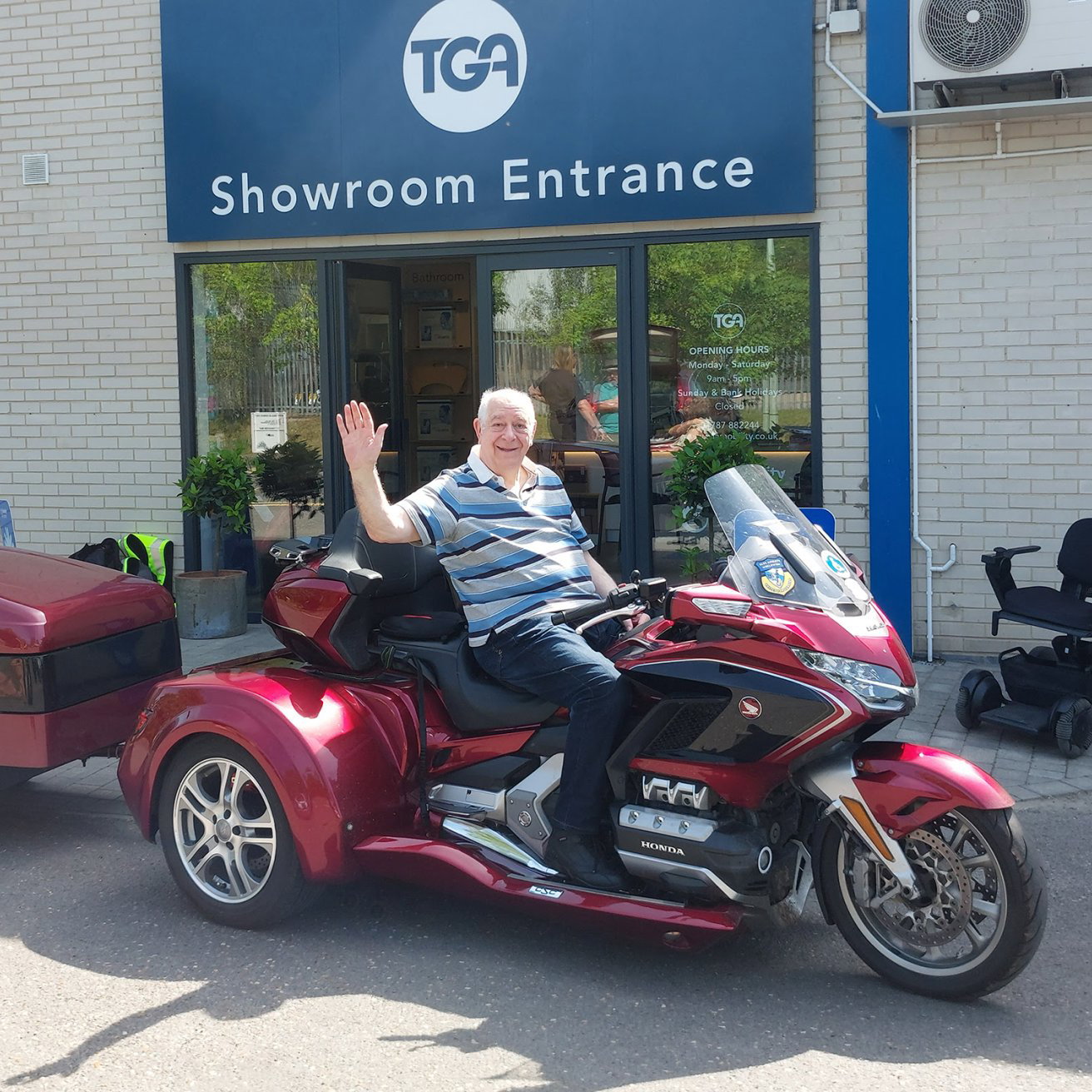 Max Jones sitting on his Honda Gold Wing trike.
