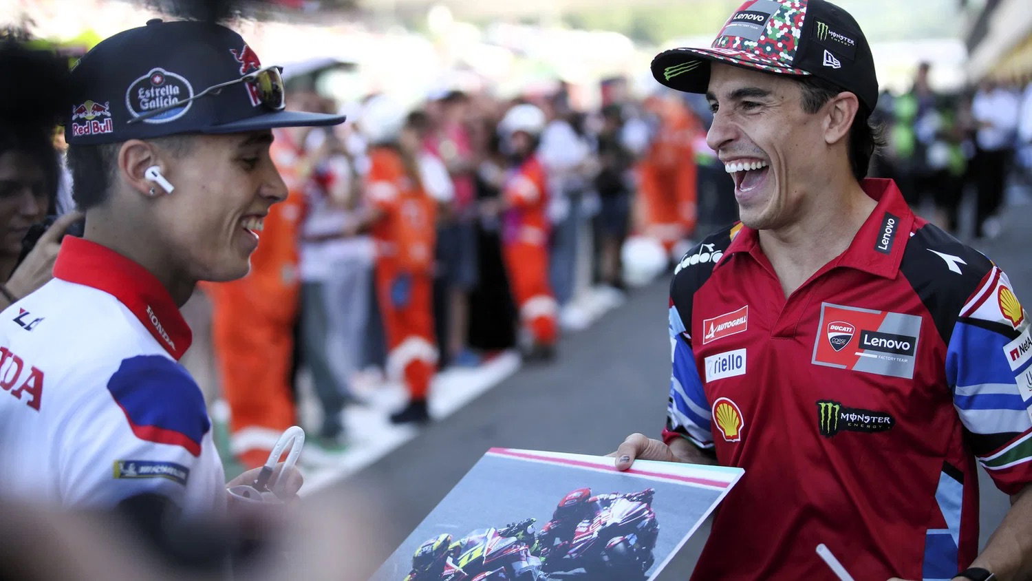 Diogo Moreira chatting to Marc Marquez