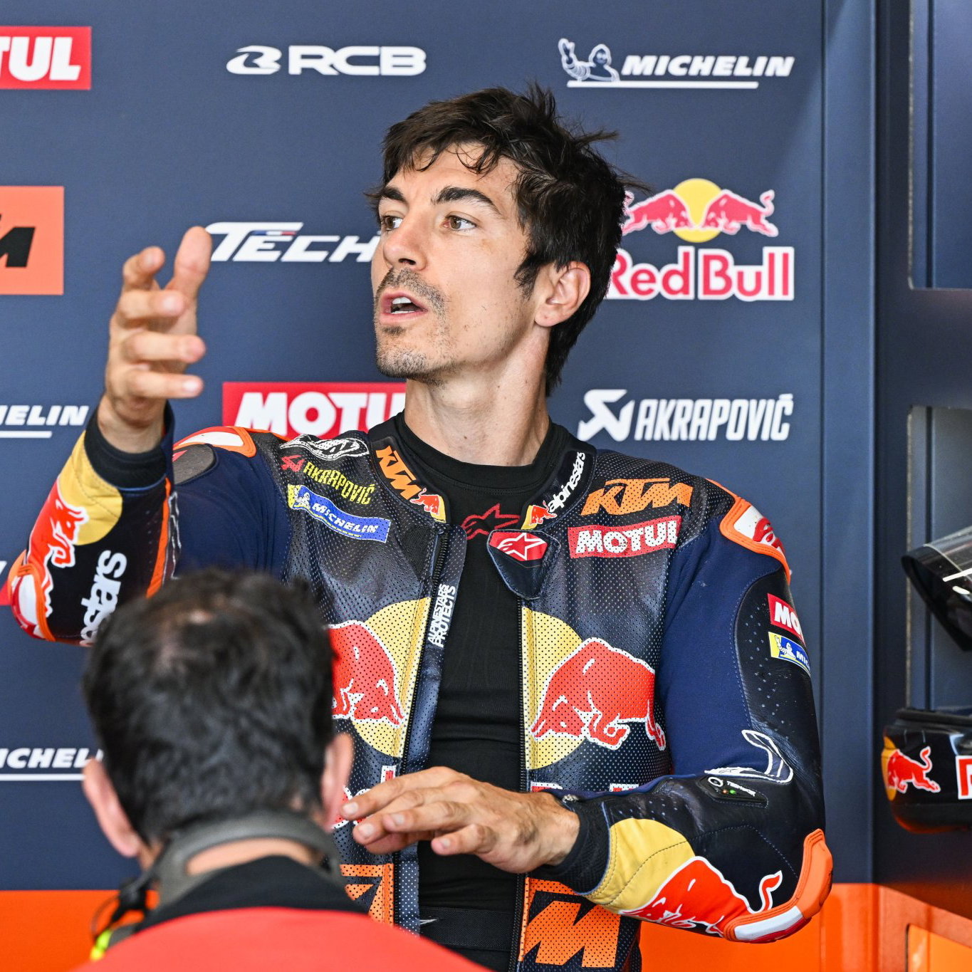 Maverick Vinales gesturing at a MotoGP race. Credit: Gold and Goose.