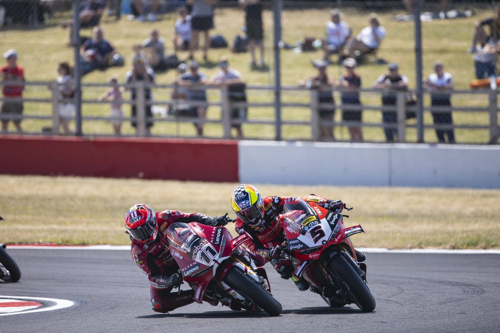 Nicolo Bulega racing against Yari Montella. Credit: Gold and Goose.