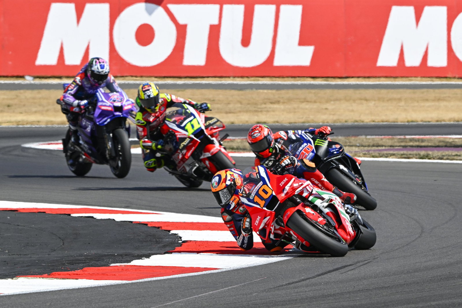 Luca Marini ahead of Fabio Quartararo. Credit: Gold and Goose.