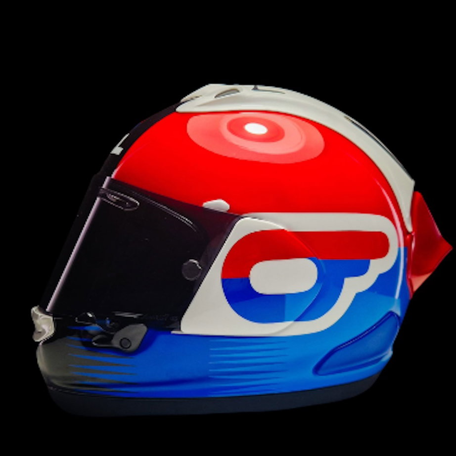 An MCL26 liveried Arai motorcycle helmet