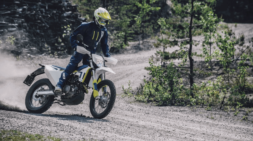 A Husqvarna enduro motorcycle in action.