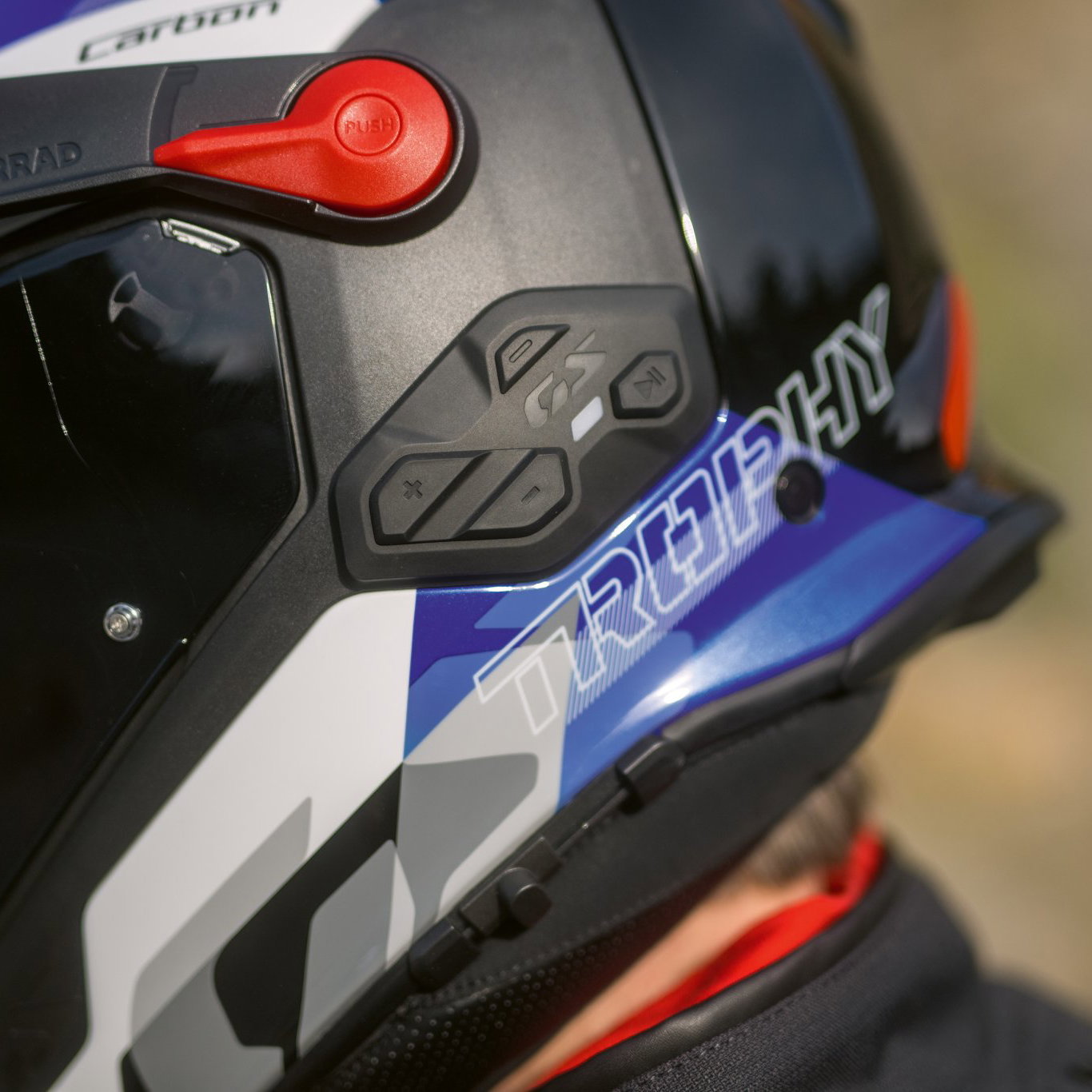 Sena comms system on a BMW GS Rallye Carbon helmet.
