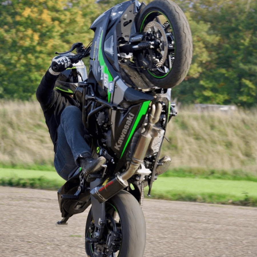 Rick English performing a wheelie. Credit: Kawasaki UK/Facebook.