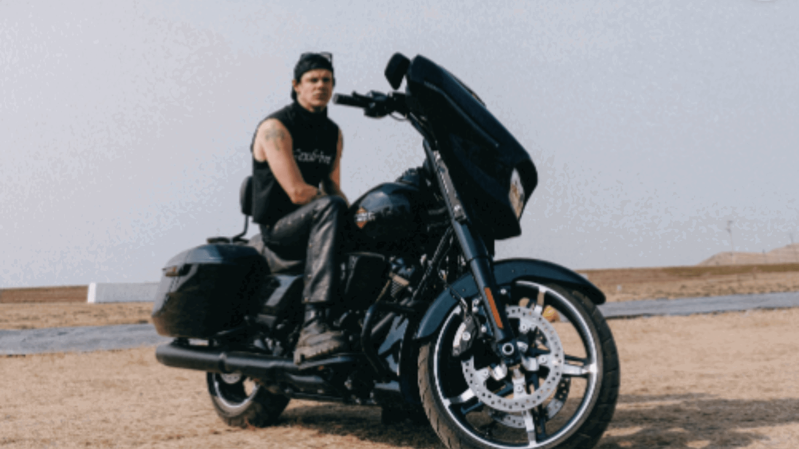 Yungblud sitting on a Harley-Davidson motorcycle. Credit: Yungblud/Instagram.