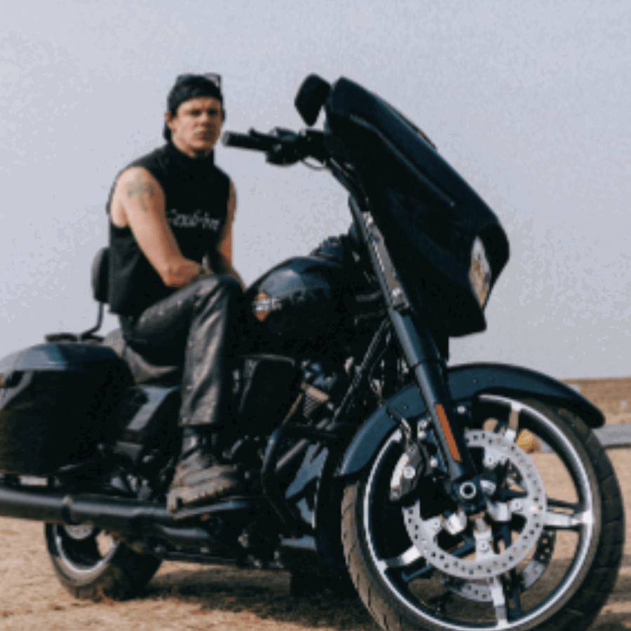 Yungblud sitting on a Harley-Davidson motorcycle. Credit: Yungblud/Instagram.