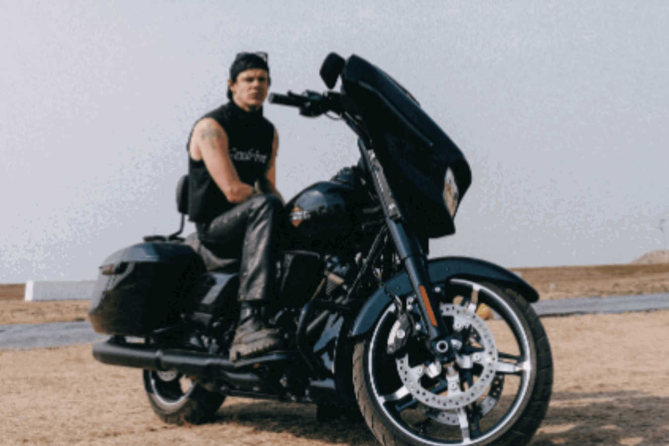 Yungblud sitting on a Harley-Davidson motorcycle. Credit: Yungblud/Instagram.