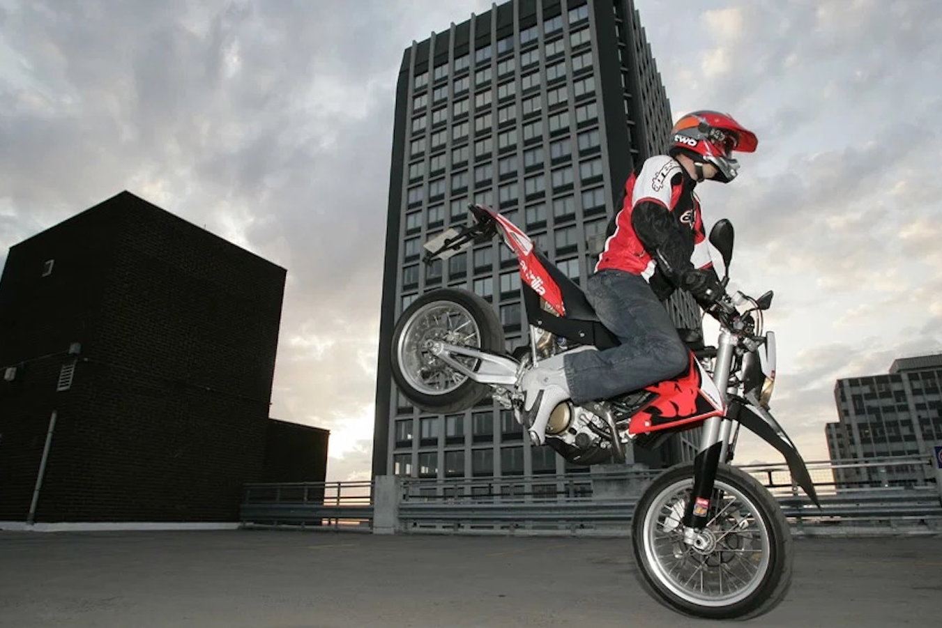 An Aprilia SXV5.5 performing a 'stoppie'
