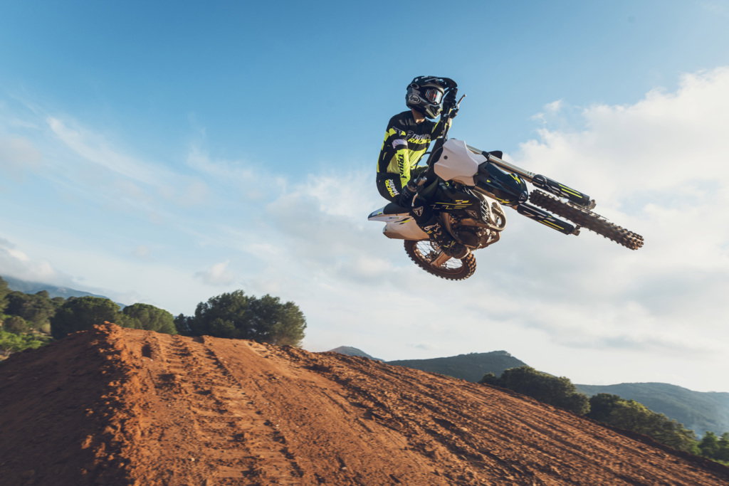 Triumph TF 250-X flying through the air.
