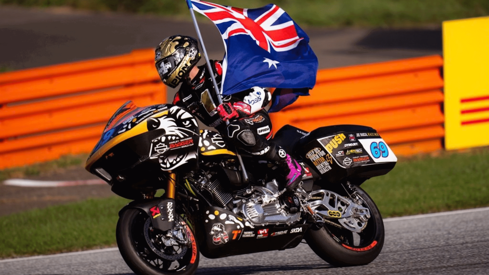 Archie McDonald riding a Harley-Davidson bagger in Austria.
