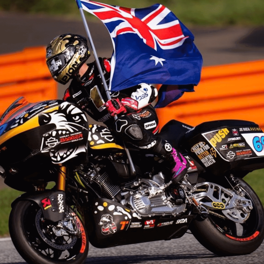 Archie McDonald riding a Harley-Davidson bagger in Austria.