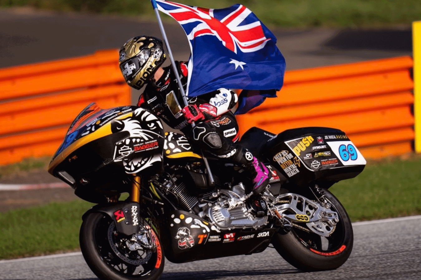 Archie McDonald riding a Harley-Davidson bagger in Austria.