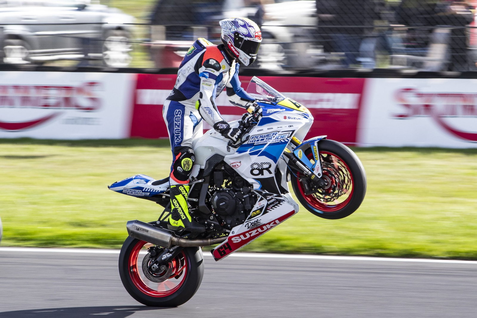 Suzuki GSX-8R pulling a wheelie.