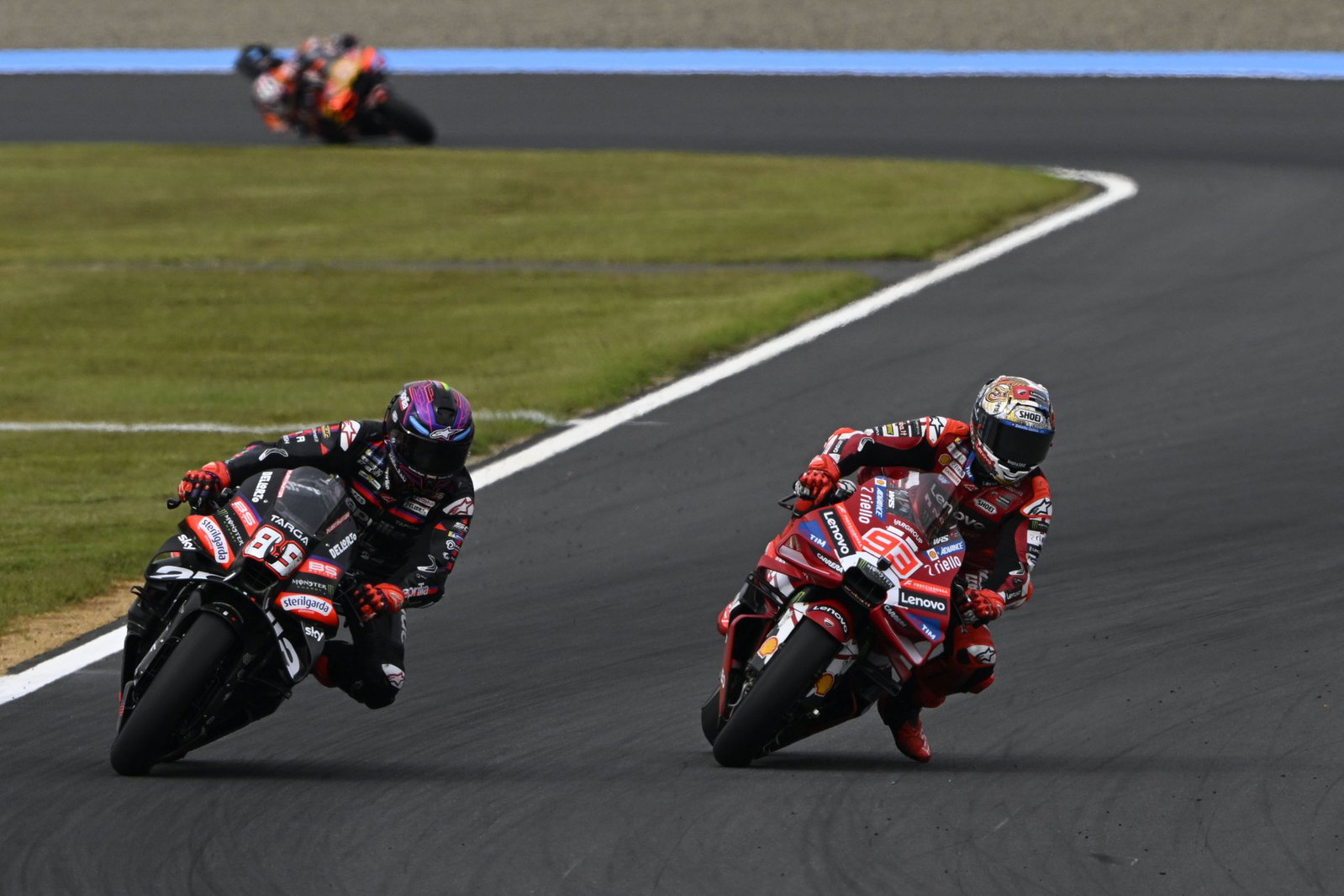 Marc Marquez overtaking Jorge Martin. Credit: Gold and Goose.