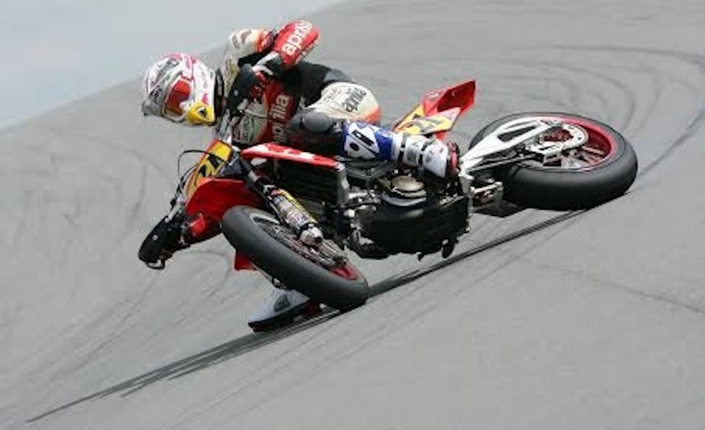 Christian Iddon sliding a supermoto at Donington